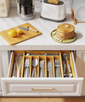Expandable Bamboo Silverware Organizer For Kitchen Drawers in use, big capacity tray with utensils arranged in compartments.