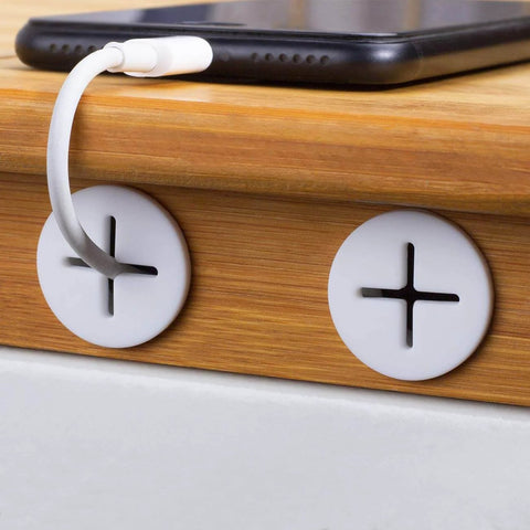 Eight Pack Three Quarter Inch Cable Cord Grommets for desk wall holes, white silicone rubber for cable management, installed on wooden desk