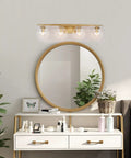 Gold Vanity Light Fixture For Bathroom Over Mirror With Four Lights, Clear Globe Glass Shades, above modern dressing table