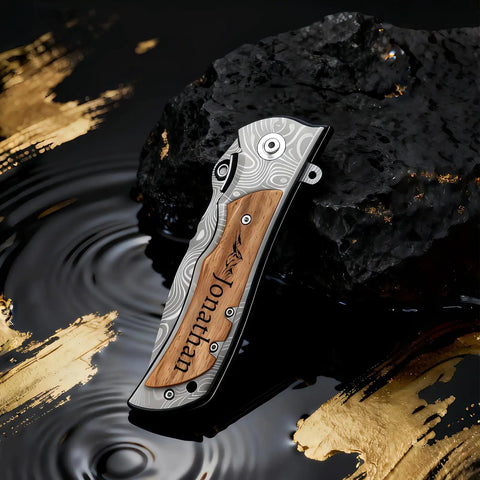 Engraved Custom Pocket Knife For Men, Personalized Name And Message, with premium steel handle on decorative background.