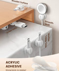Six Pack 360 Degree Rotatable Cord Organizer Clips with One Second Lock Spring Cord Holder installed on desk and wall surfaces