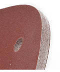 Close-up of Heavy Duty 9 Inch Sandpaper With 6 Holes Premium Hook and Loop Discs for Electric Polisher, showing texture and hole detail.