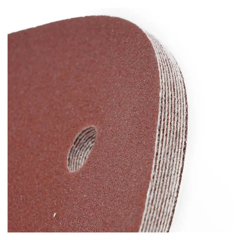 Close-up of Heavy Duty 9 Inch Sandpaper With 6 Holes Premium Hook and Loop Discs for Electric Polisher, showing texture and hole detail.