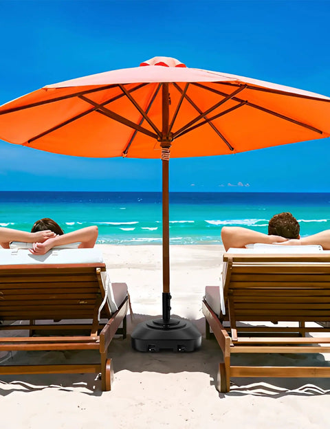 Beach setup with Universal Umbrella Pole Mount Tube And Base Replacement Parts Set on sandy shore, featuring heavy-duty stainless steel holder.