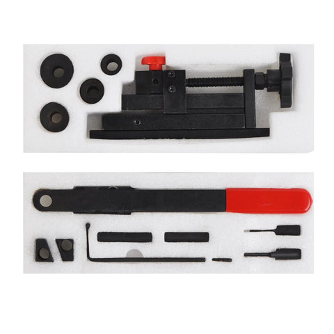 Mini universal manual bending tool kit for wire, flat metal and tubing with red-handled bar and assorted dies.