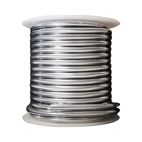 Artist Pure 50/50 Stained Glass Solder 0.125 Inch 1 Pound Tin Lead Alloy spool for glass art projects, close-up view.