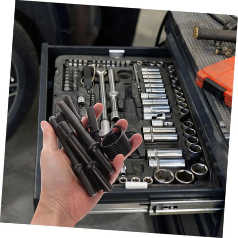 Hand holding tools from Heavy Duty Pneumatic Rivet Tool Kit With Air Chisel for drilling and riveting in mechanic's tool drawer