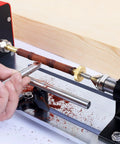 Six Millimeter Wood Lathe Pen Mandrel Kit with adjustable length in use on a lathe for DIY pen making, universal fit setup