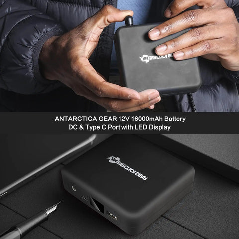 Lightweight Heated Jacket With 12V Power Bank, Six Zone Carbon Fiber Heating battery in hand, suitable for outdoor gear.