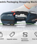 Heavy Duty Electric Strapping Tool For 13Mm To 16Mm Pp Pet Straps With Hella Long Lasting Rechargeable Battery Hot Melt Sealer on table.