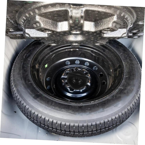 Spare Tire Bolt Retainer Clamp for Vehicle Wheels securing a spare tire inside a car trunk, durable wheel retainer clip visible.