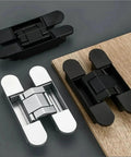 Pair Of Heavy Duty Hidden Door Hinges For Wood Cabinets Adjustable Black Folding Hardware Built Tough Eighty Kilogram Bearing Capacity With Sleek Concealed Finish displayed in black and silver options on wood.
