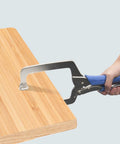Person using Heavy Duty C Clamp With Swivel Pads Vise Grip Locking Pliers 18 Inch Face Clamp for securing a wooden board.