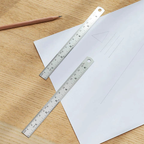 6 Inch Stainless Steel Ruler Set Of 4 With Safe Non Sharp Edge For Students And DIY Projects Durable Rustproof Metal Measuring Tool on desk