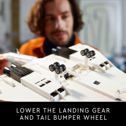 Man admiring Iconic Concorde Model Aircraft Building Kit For Adults with realistic details and functional landing gear