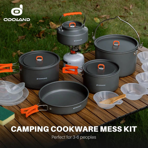 18Pcs Camping Cookware Set With Large Hanging Pots Pan And Kettle Plus Plastic Plates Bowls Spoon Spatula And Sponge on table