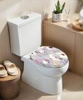 Soft Close Elongated Toilet Seat for Bathroom featuring floral design on elongated toilet in modern bathroom setting.