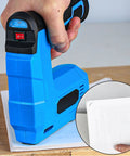 Slick Cordless Electric Brad Nailer And Staple Gun Rechargeable 2 In 1 Bottom Loading Fastening Tool with hand holding blue tool fastening pages.