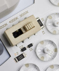 Close-up of ColorQuick CCT switch on Next-Level Color Temperature Selectable LED Flush Mount Ceiling Light, 3000K to 5000K range.