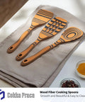 Premium Wooden Cooking Spoon Set of Three Dishwasher Safe and Heat Resistant Kitchen Utensils for Nonstick Pans on a linen cloth.