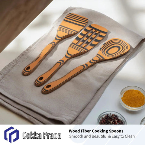 Premium Wooden Cooking Spoon Set of Three Dishwasher Safe and Heat Resistant Kitchen Utensils for Nonstick Pans on a linen cloth.