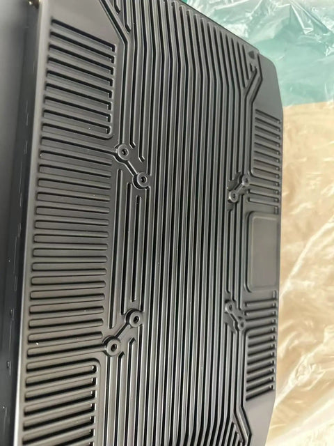 Heavy Duty 15.6 Inch Industrial Tablet Pc Featuring Tough As Nails Android Touchscreen Built Like A Tank Aluminum Chassis And Prograde Cooling For Smooth Automation Controls back panel with vented grooves and mounting holes.