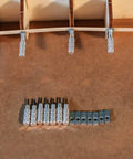 All-Metal Ship Planking Clamps Set Of 10 For Model Shipbuilding arranged on wooden surface showing knurled aluminum handles.