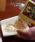 Restor A Shine Hardwood Floor Polish For Wood Furniture Polishing Compound 16 Oz poured on cloth for surface polishing
