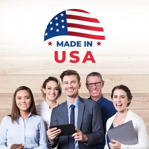 Group of five people smiling under 'Made in USA' logo with American flag design on wooden background.