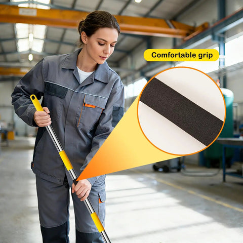 Person using Heavy Duty Commercial Mop With 54 Inch Handle And 53 Inch Stainless Steel Mop Handle Wet Cotton Mop Head in workshop.