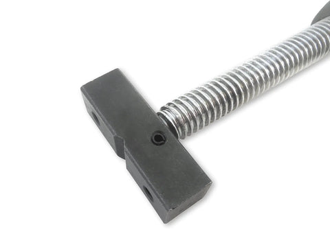 Close-up of adjustable inline bench dog screw clamp for three quarter inch holes with full five inch travel, ideal for woodworking.