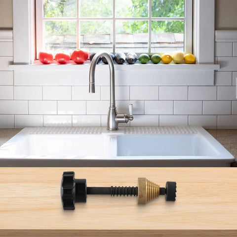 The Badass Faucet Reseating Tool With Precision Guide And Twin Steel Cutters To Nix Stubborn Leaks and chip off mineral crust fast on a kitchen countertop.