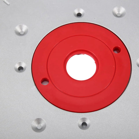Upgrade Your Shop Game With This Heavy Duty Aluminum Router Table Insert Plate showing precision center hole bushing and mounting holes.