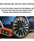 Hella Tough Gm Tpms Relearn Trigger 315 433 Mhz Sensors Fast Wheel Swap Tool positioned near tire sidewall for pressure detection.
