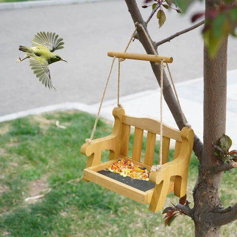 Set Of 2 Wooden Swing Bird Feeders For Outdoor Hangin With Metal Mesh Bottom, bench style hanging on tree with bird approaching