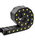 Heavy Duty Nylon Cable Drag Chain 30 X 57 Mm Closed Energy Carrier With End Connectors For Cnc Routers in a coiled position.