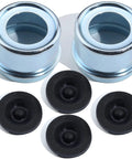 Two chrome trailer axle dust cap cups and four black rubber plugs