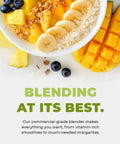 Bowl of assorted fruits and coconut flakes, highlighting the capabilities of Beast Pro Grade Countertop Blender With 3 HP 1800W Motor 64 Oz Jar.