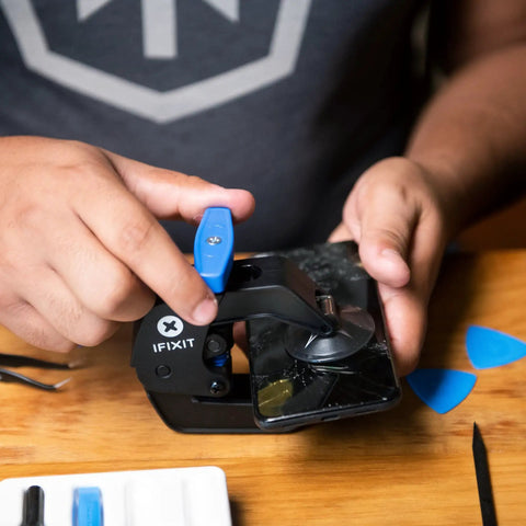 Pro Grade Anti Clamp Opening Tool for Phones and Tablets with dual suction cups in use separating a phone screen