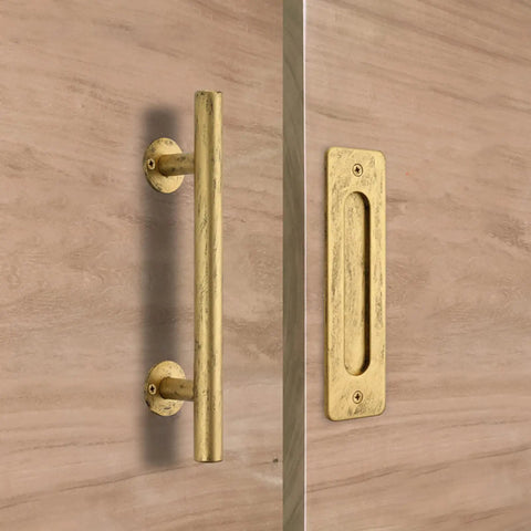 12 Inch Gold Barn Door Handle Set With Round Pull, Flat Finger Pull, visible on wooden surface, part of sliding hardware kit.
