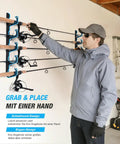 Person using Heavy Duty Fishing Rod Holder 2 Pack for Garage Storage Ceiling Or Wall Mount Rod Rack with Protective TPR Coating