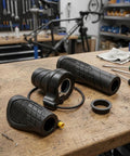 Upgrade Your E-Bike Ride With This 20X Half Turn Throttle Grip Featuring Cool M8 Head Design And Slick Anti-Slip Texture For Nail-It Precision Control Smooth Power Delivery Guaranteed. Black half-turn e-bike throttle grip with M8 head and textured rubber on a workbench.
