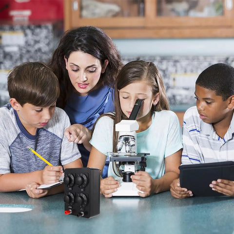Built Tough Variable Resistor Panel With 0 To 9999 Ohm Range next to students using a microscope in a classroom.