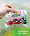 Dinosaur Gummy Lab Kit For Kids Crazy Fun And Delicious Make Up To 72 Dinosaur Shaped Gummies In Purple Mixed Berry And Green Watermelon Flavors With Citric Acid For Sour Gummies Includes 8 Dino Shapes Safe To Eat STEM Cooking Experiment Made In USA clear bag of dino gummies