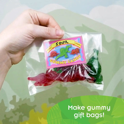 Dinosaur Gummy Lab Kit For Kids Crazy Fun And Delicious Make Up To 72 Dinosaur Shaped Gummies In Purple Mixed Berry And Green Watermelon Flavors With Citric Acid For Sour Gummies Includes 8 Dino Shapes Safe To Eat STEM Cooking Experiment Made In USA clear bag of dino gummies