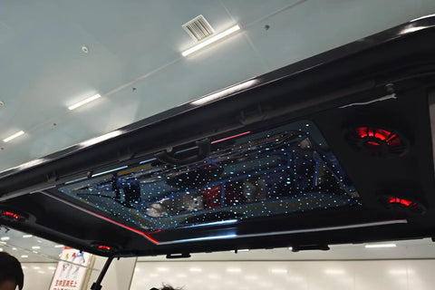 View of the integrated sunroof showcasing stars and speakers on the Sweet Setup Four Seater Electric Golf Cart With Powerful 48V Motor.