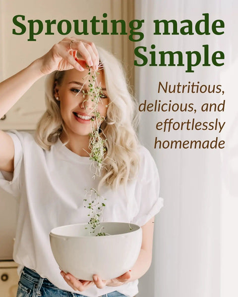 Person holding a bowl of fresh sprouts in a home kitchen while smiling, promoting easy and nutritious homemade sprouting.