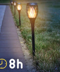 P2 Solar Flickering Flame Torch Light With Realistic Fire, IP65 Waterproof Outdoor Tiki Lamp installed along garden walkway