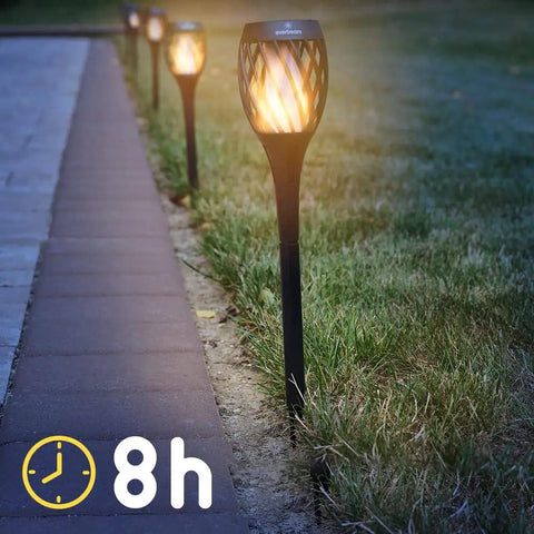 P2 Solar Flickering Flame Torch Light With Realistic Fire, IP65 Waterproof Outdoor Tiki Lamp installed along garden walkway