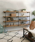 Industrial Pipe Shelving Set Wall Mounted Rustic Floating Iron Shelves For DIY Bookshelf Brackets in living room with decor items.